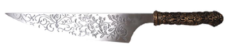 Illustration for article titled American McGee's Alice Vorpal Blade Goes Snicker-Snack For Real